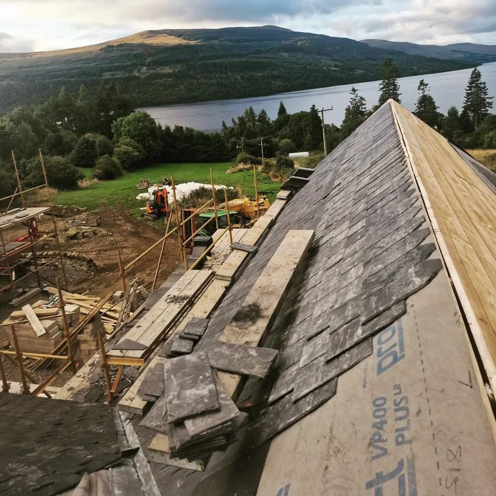Full re-slate in progress with new sarking boards